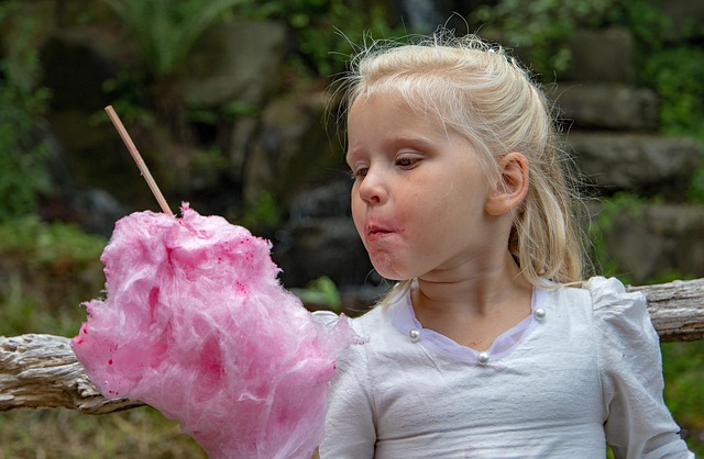 Child with cotton candy